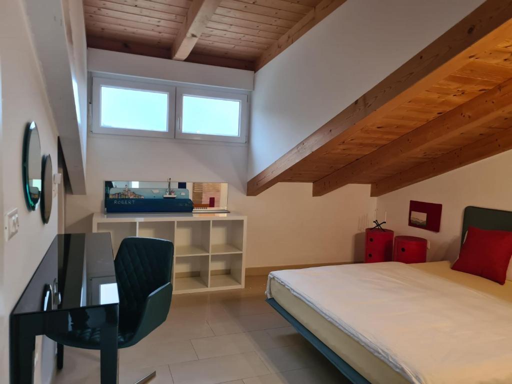 Postel nebo postele na pokoji v ubytování Robi