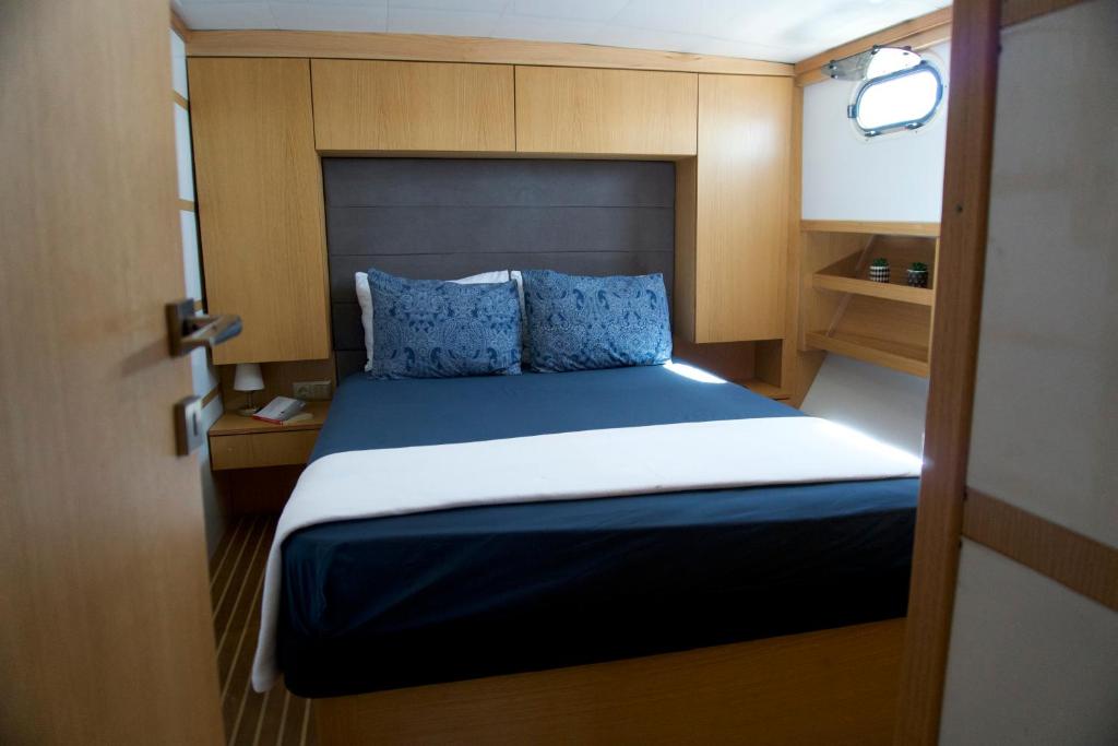 Un pat sau paturi într-o cameră la Albatros-Q