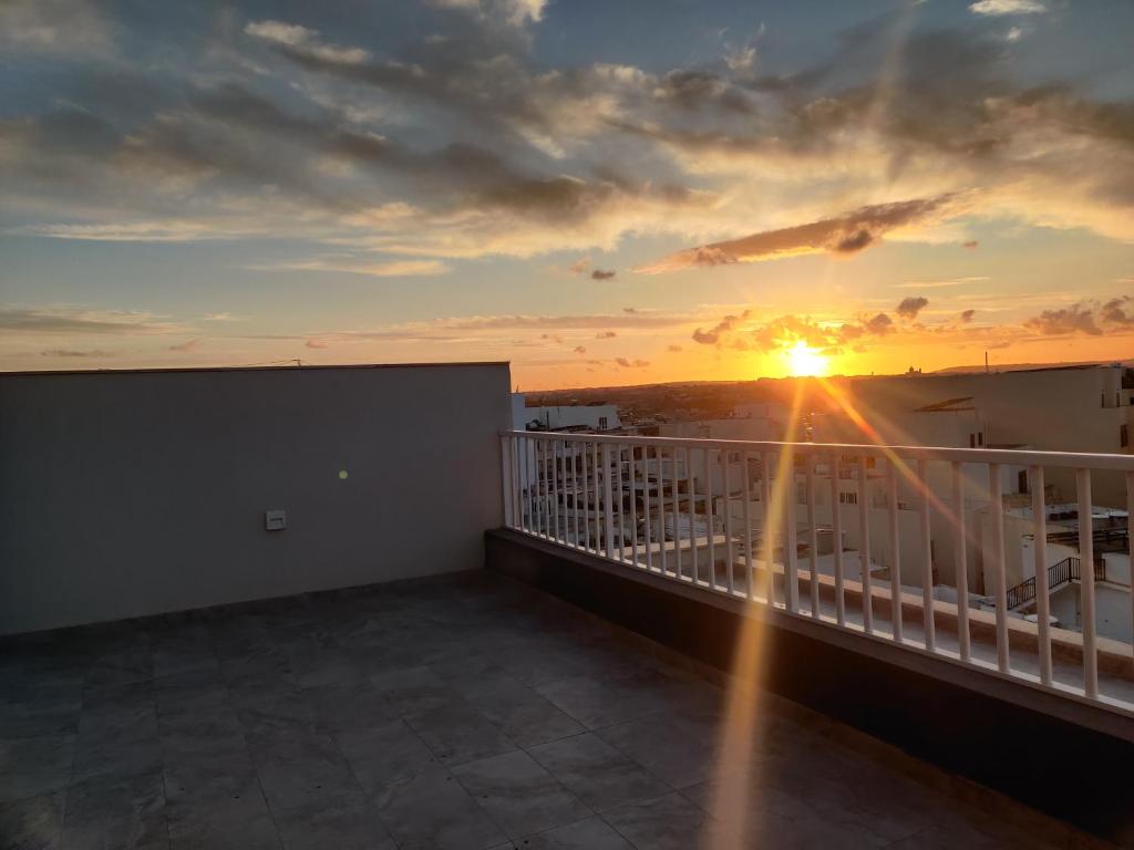 Východ nebo západ slunce při pohledu z apartmánu nebo okolí