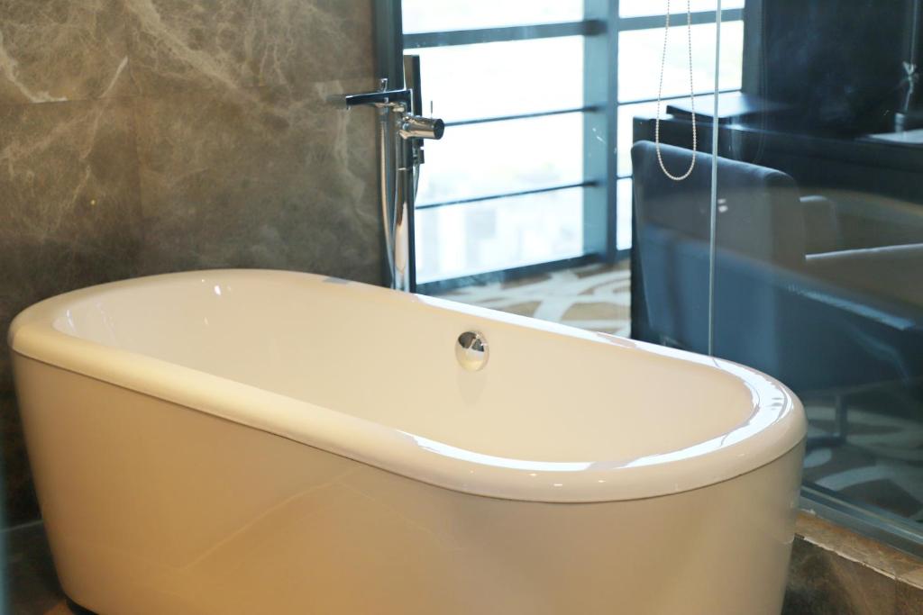 Koupelna v ubytování Four Points by Sheraton Qingdao, West Coast
