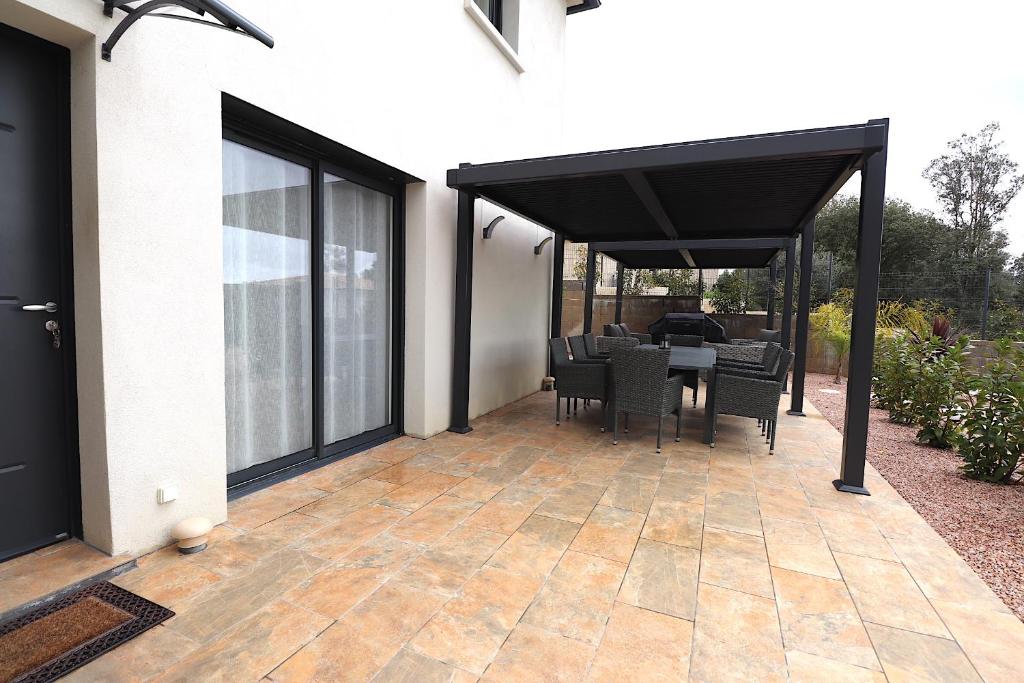 Patio nebo venkovní prostory v ubytování MAISON à Ajaccio tout CONFORT- proche plage et aéroport- Extérieur privatif avec barbecue