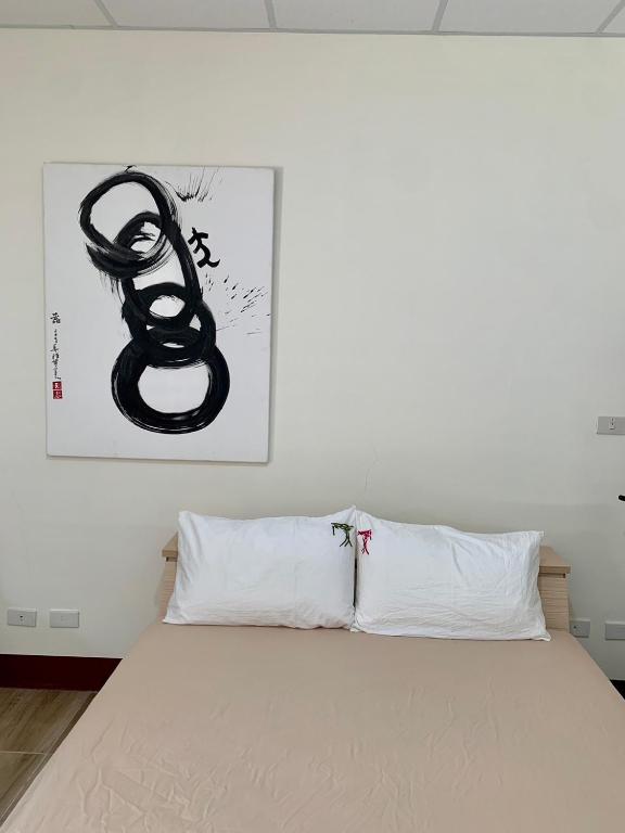 Postel nebo postele na pokoji v ubytování People Hostel Taiwan Image Calligraphy Museum