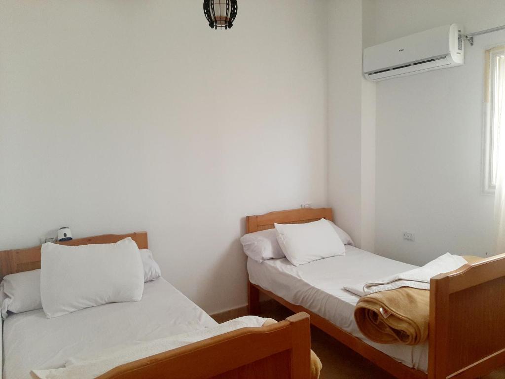 Postel nebo postele na pokoji v ubytování Alam B&B