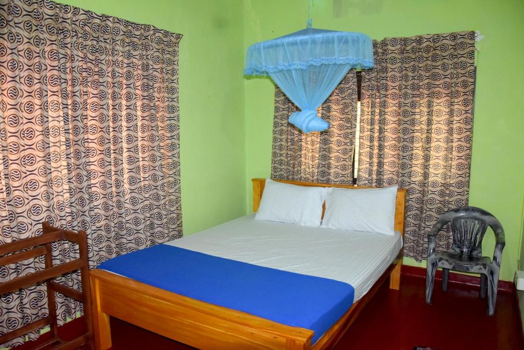 Postel nebo postele na pokoji v ubytování Vidu Guest Anuradhapura