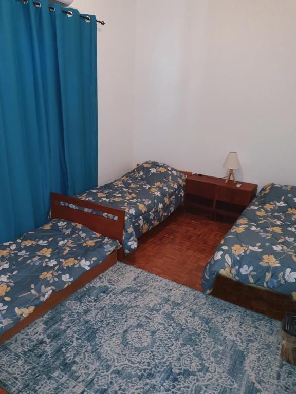 Postel nebo postele na pokoji v ubytování Indie7house
