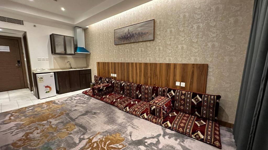 Postel nebo postele na pokoji v ubytování Multazam Al-Nnaseem Hotel