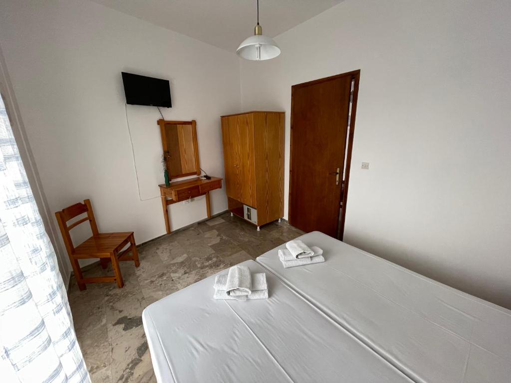 Postel nebo postele na pokoji v ubytování Studio Bellos