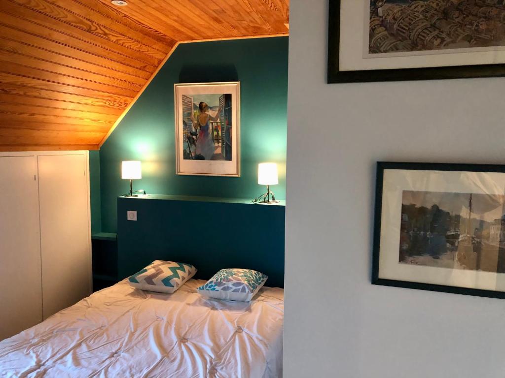 Postel nebo postele na pokoji v ubytování Villa Tidinghi, plage de Rospico à pied