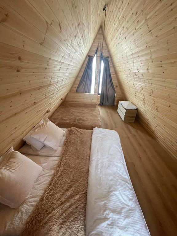 Postel nebo postele na pokoji v ubytování Kai cottage