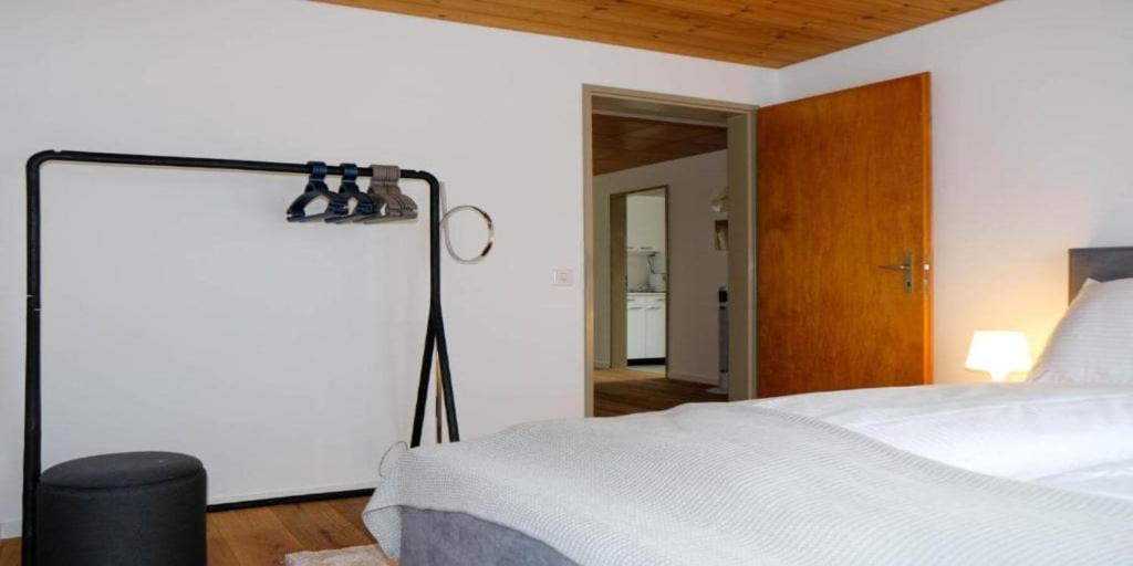 Postel nebo postele na pokoji v ubytování Mariposa Spiez
