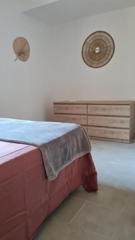 En eller flere senge i et værelse på Maison individuelle entierement rénovée