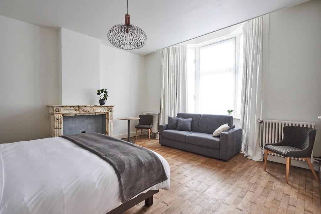Postel nebo postele na pokoji v ubytování Maison Cambier