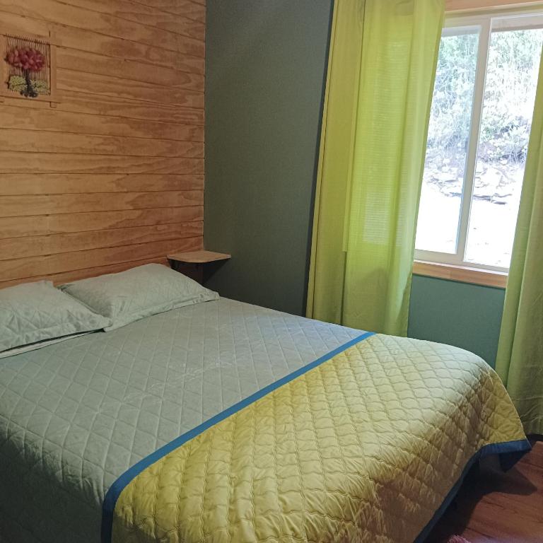 Postel nebo postele na pokoji v ubytování Cabaña Loremar canaan