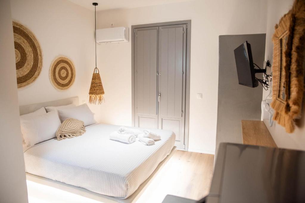 Postel nebo postele na pokoji v ubytování Aidani Luxurious Rooms