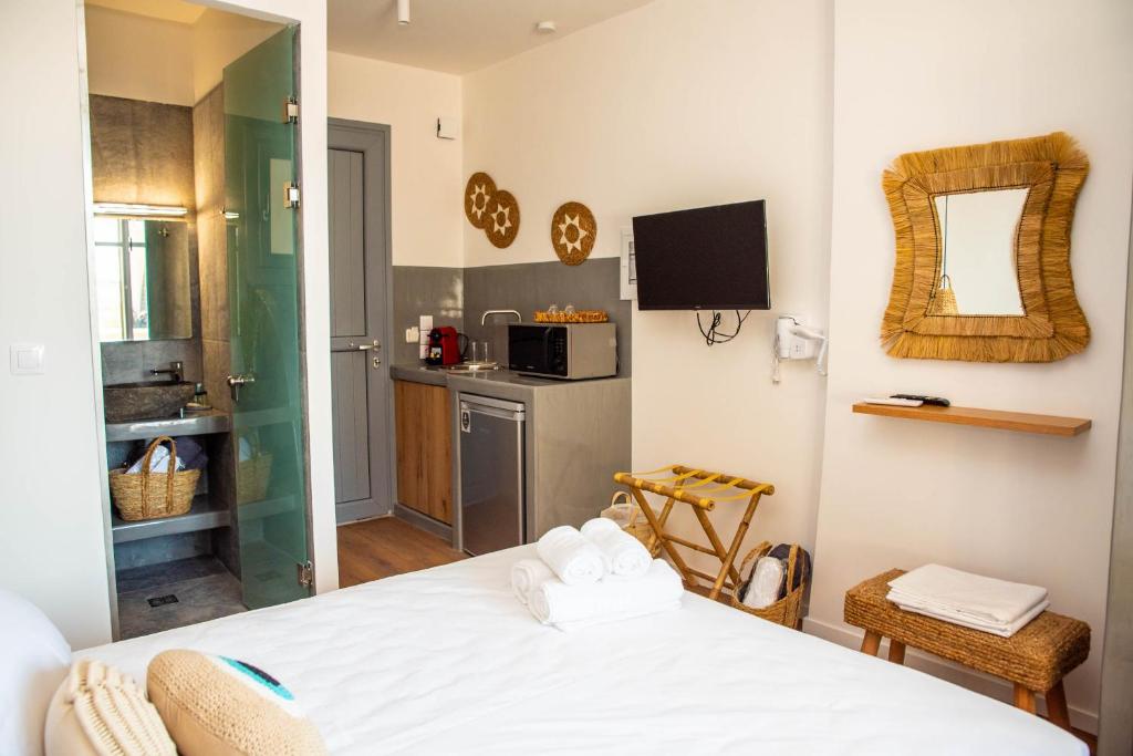Kuchyň nebo kuchyňský kout v ubytování Aidani Luxurious Rooms