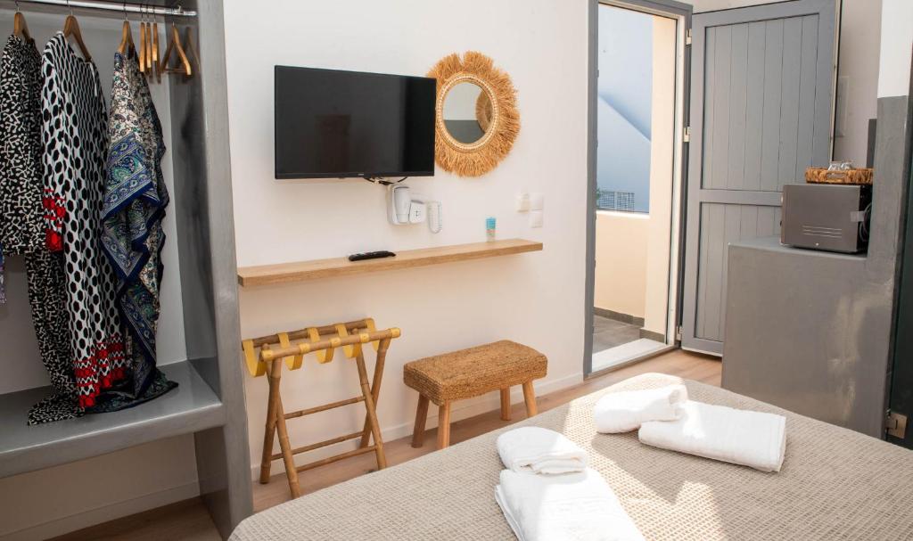 TV a/nebo společenská místnost v ubytování Aidani Luxurious Rooms