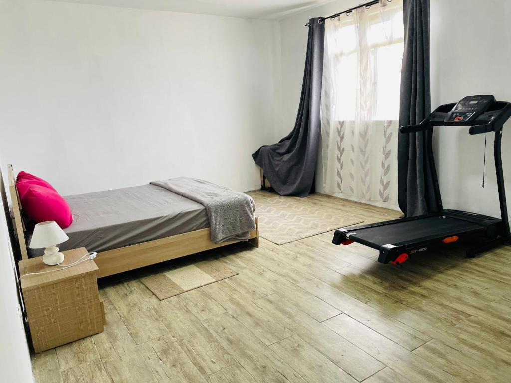 Postel nebo postele na pokoji v ubytování Maison Stacie