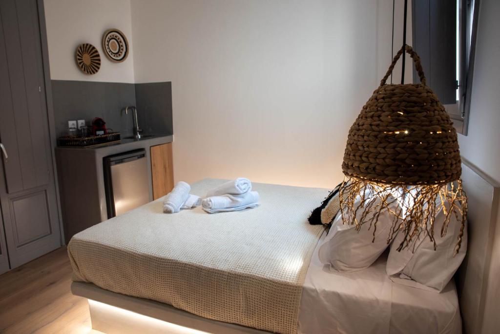 Postel nebo postele na pokoji v ubytování Aidani Luxurious Rooms
