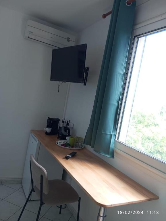 TV/trung tâm giải trí tại Chambre Vue sur Mer