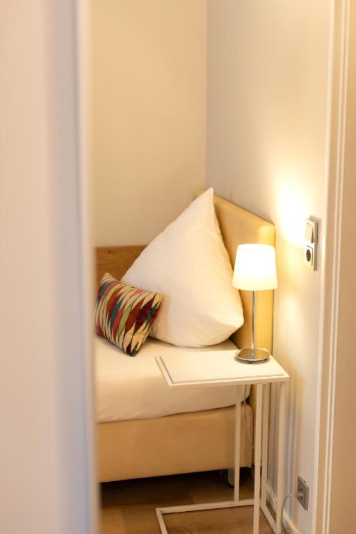 Postel nebo postele na pokoji v ubytování Hotel Herrnbrod & Ständecke