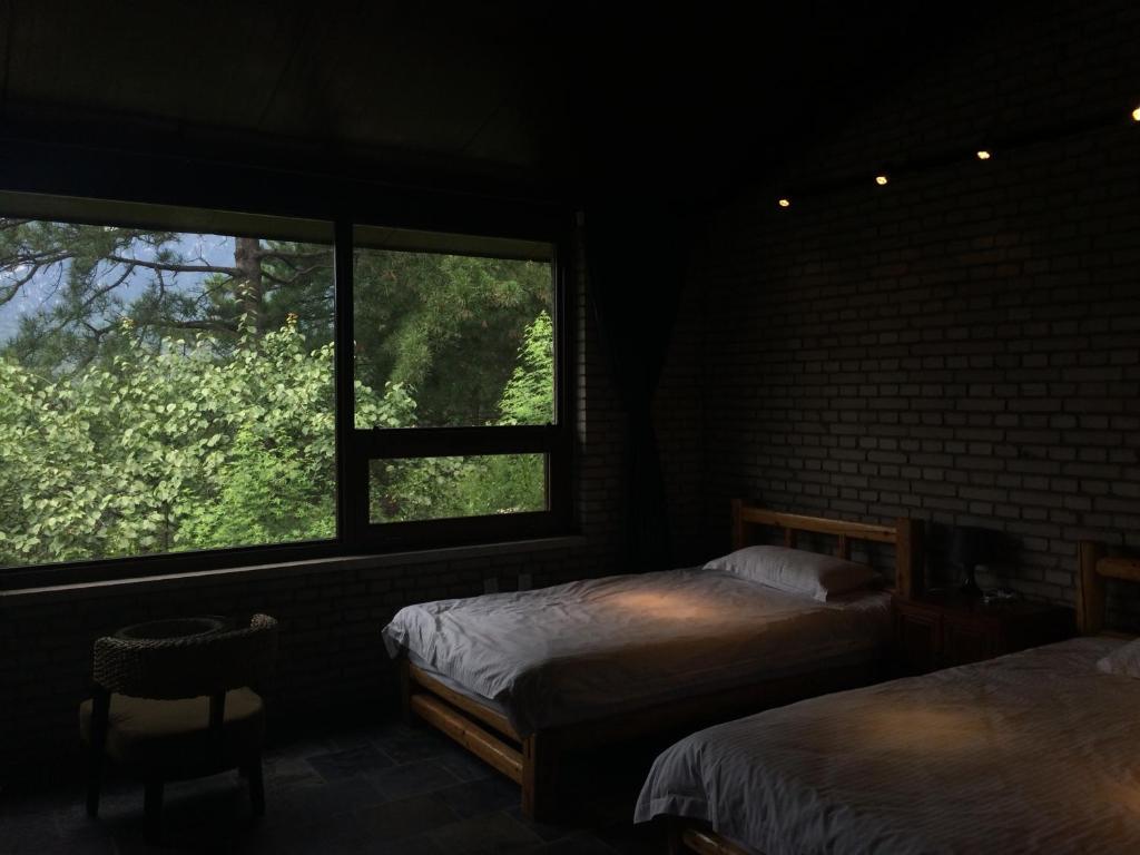 Home of the Great Wall - Estudio Familiar