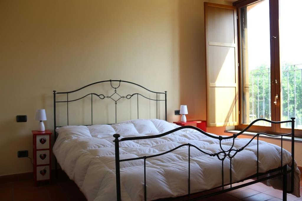 Cama o camas de una habitación en Villa Magnolia, Lucca