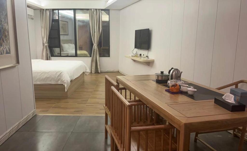 Zhuhai Dreamers Capsule Hotel - Sala Familiar Con Vista Al Jardín