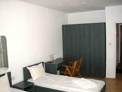 Postel nebo postele na pokoji v ubytování Hotel Pilevski