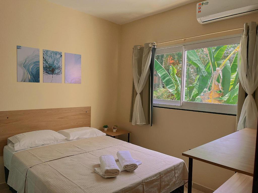 Postel nebo postele na pokoji v ubytování SOLAR DA FLORESTA
