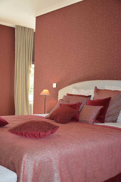 Postel nebo postele na pokoji v ubytování B & B Landhuis Ter Velt