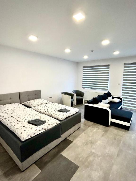 Voodi või voodid majutusasutuse Apartmány PREMIUM se soukromým parkováním toas