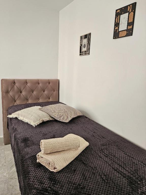 Postel nebo postele na pokoji v ubytování Mirador APARTMENTS BEACH FIRST LINE