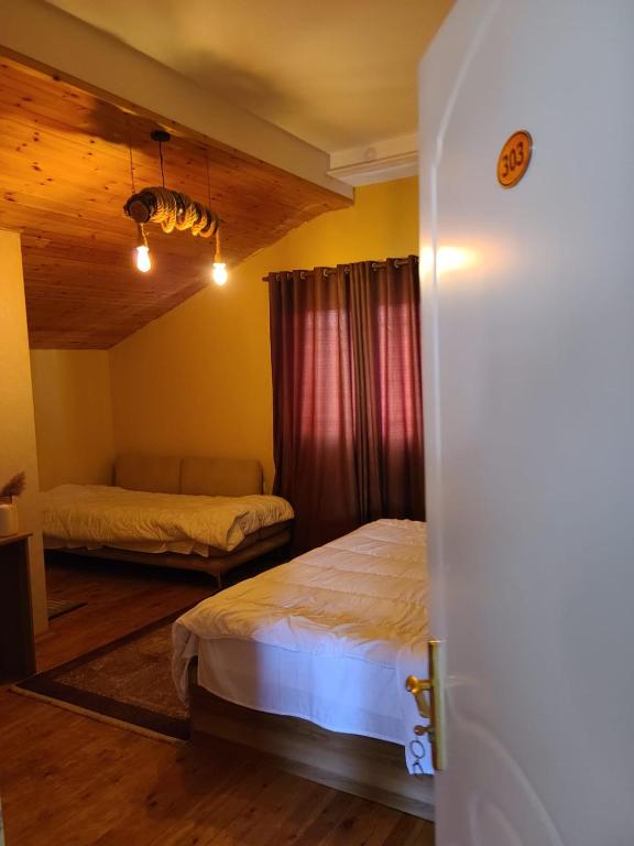 Postel nebo postele na pokoji v ubytování Villa Elear