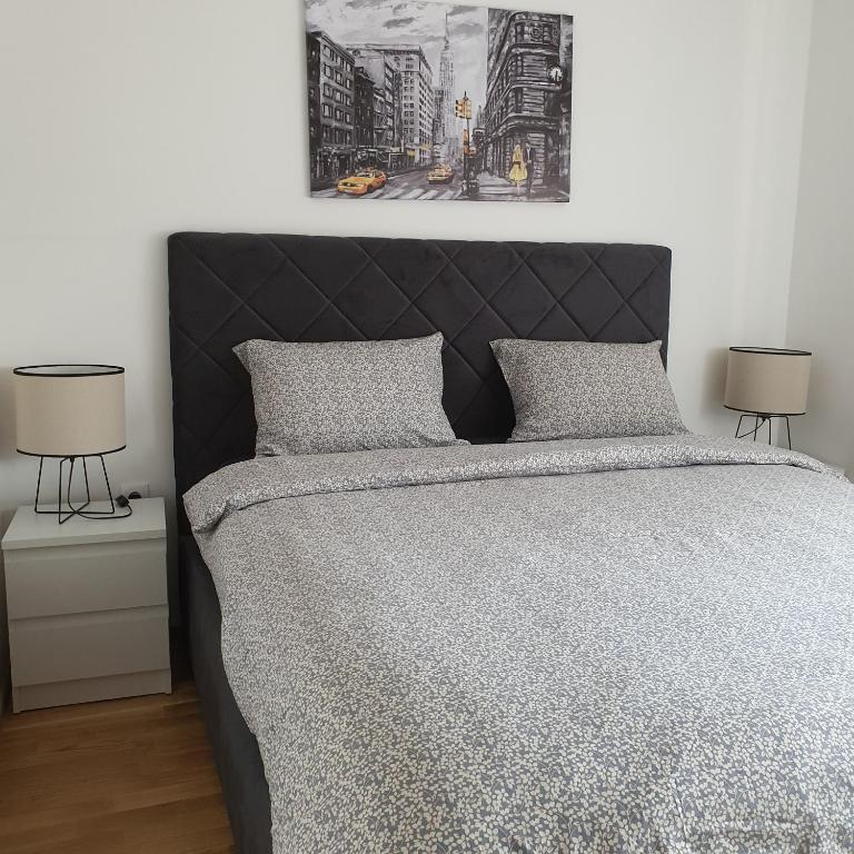 Postel nebo postele na pokoji v ubytování JR Lux apartman