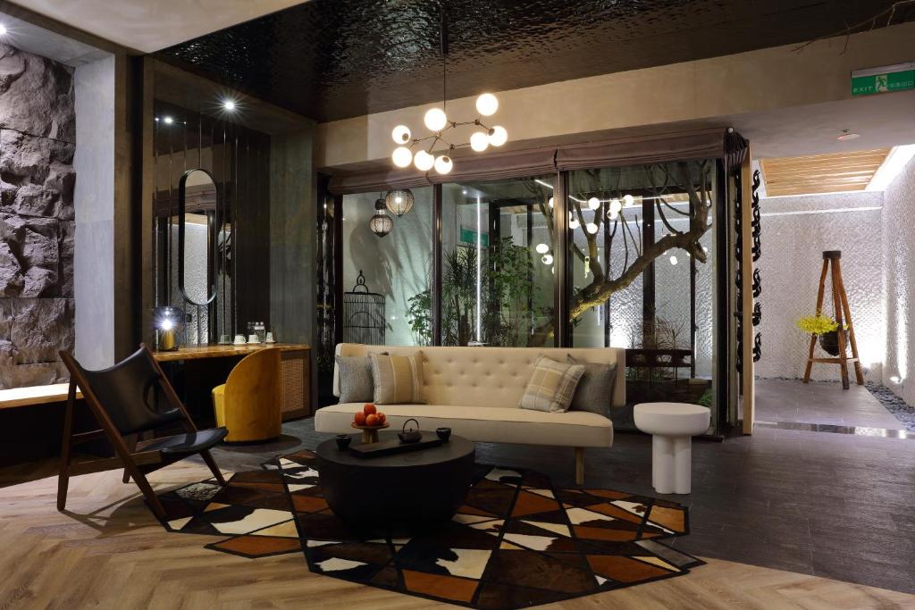 Posezení v ubytování Mulan Motel Taipei