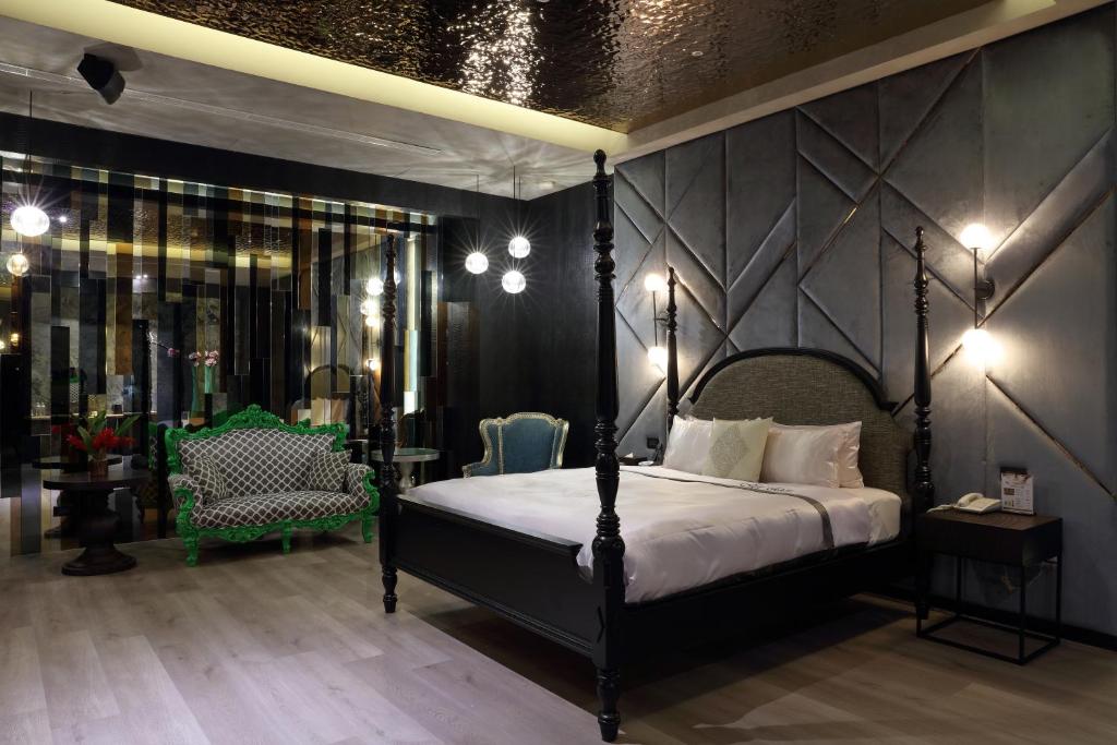 Postel nebo postele na pokoji v ubytování Mulan Motel Taipei