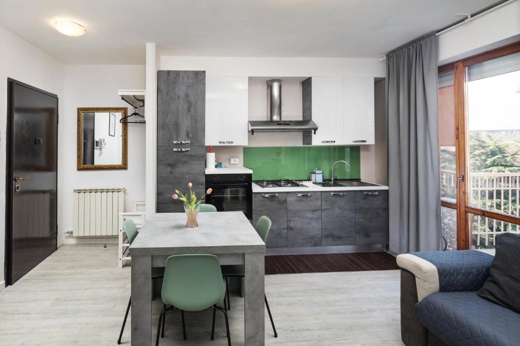 Kuchyň nebo kuchyňský kout v ubytování Apartment Forum