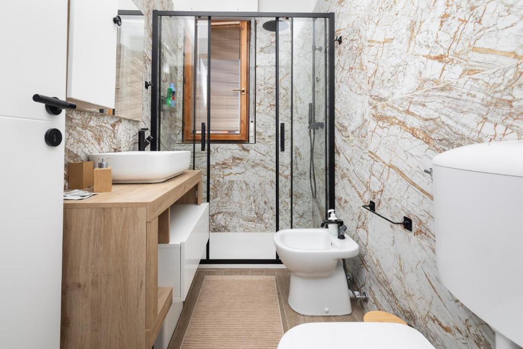 Koupelna v ubytování Apartment Forum