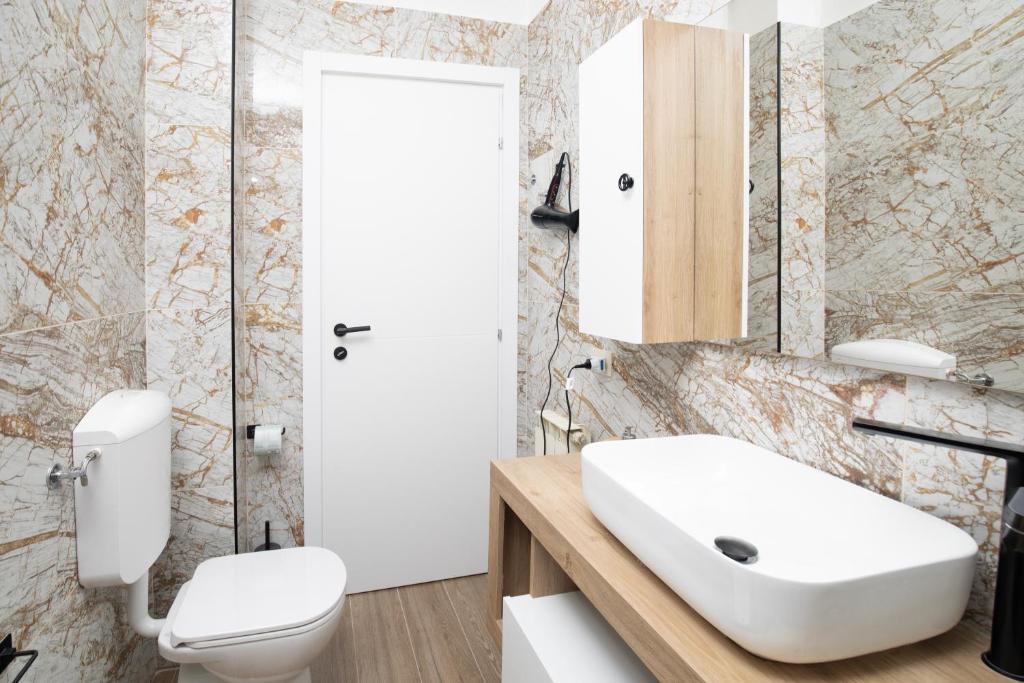 Koupelna v ubytování Apartment Forum