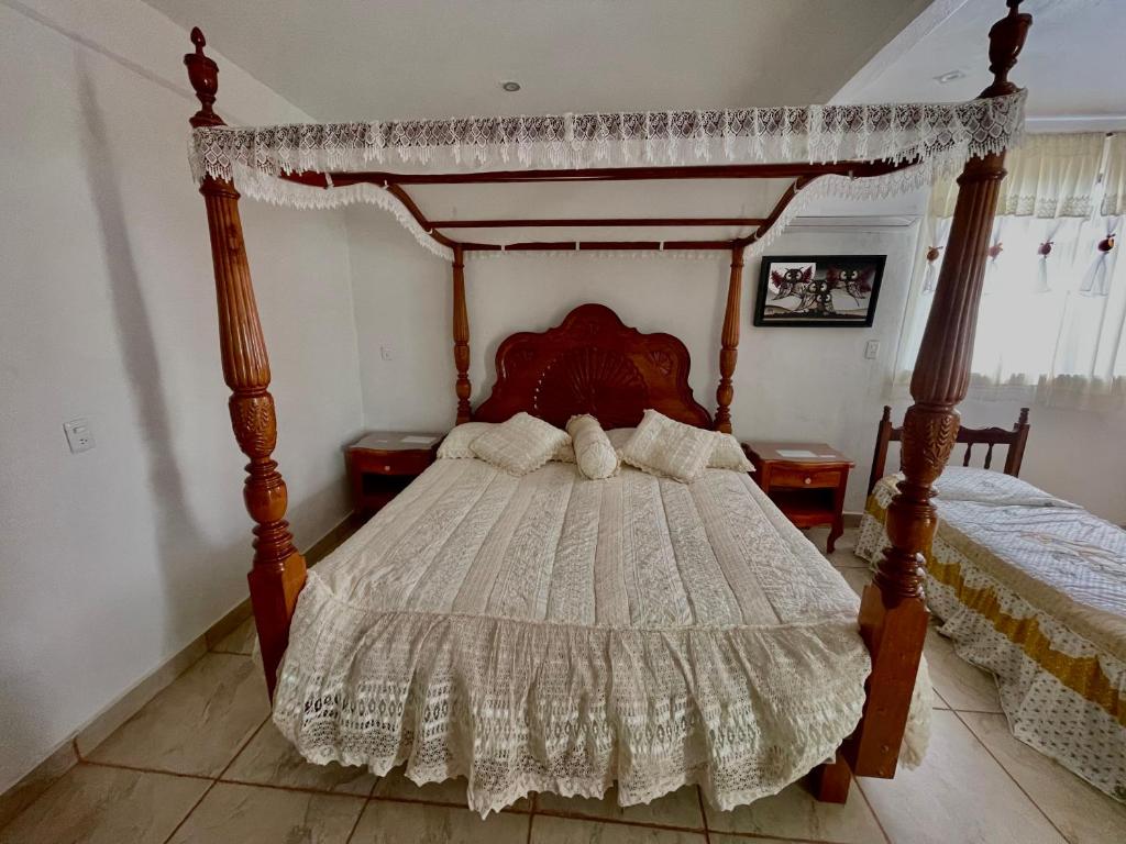 Postel nebo postele na pokoji v ubytování Hotel Cosoleacaque Centro