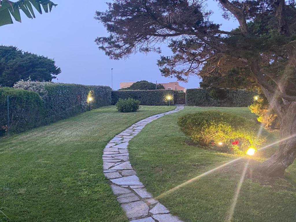 Сад в Pelosa - Capo Falcone Excellent Apartment