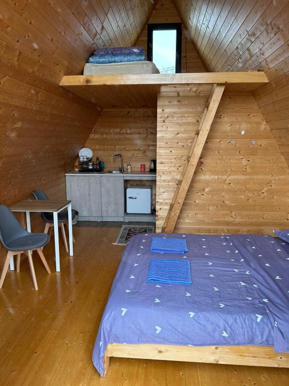 Postel nebo postele na pokoji v ubytování Cottage in Udabno