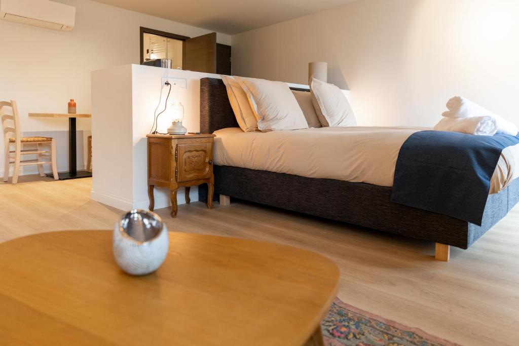 Postel nebo postele na pokoji v ubytování Li Ter Hôtel