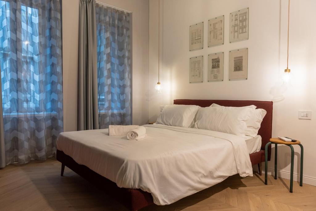 Ένα ή περισσότερα κρεβάτια σε δωμάτιο στο Sophia Boutique Suites