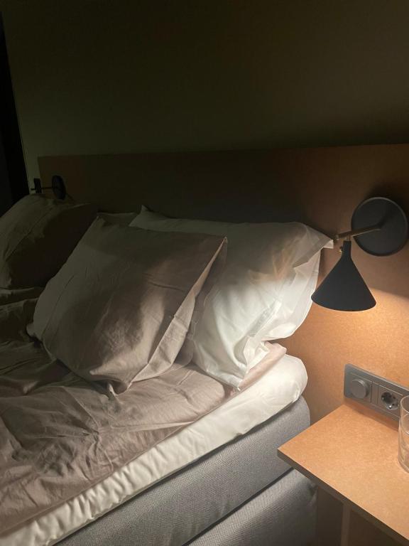 Postel nebo postele na pokoji v ubytování Chambre hotell