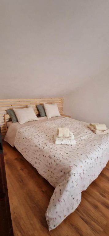 Postel nebo postele na pokoji v ubytování Il rifugio di Claudia