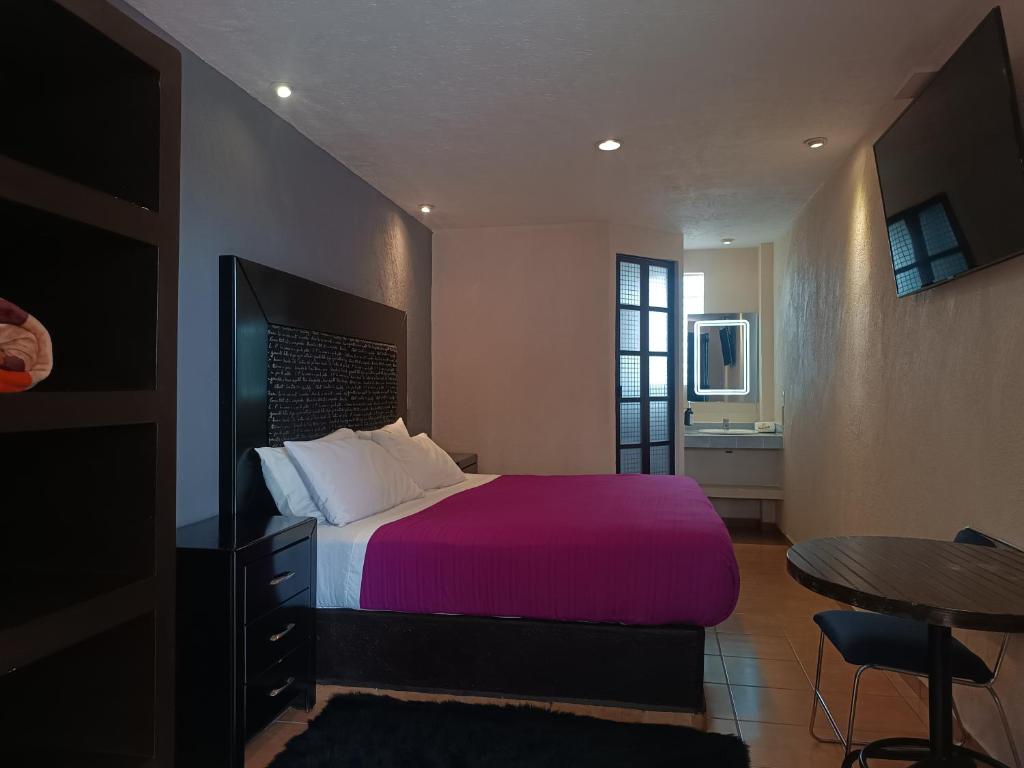 TV a/nebo společenská místnost v ubytování Hotel Real Campestre Tepetoci