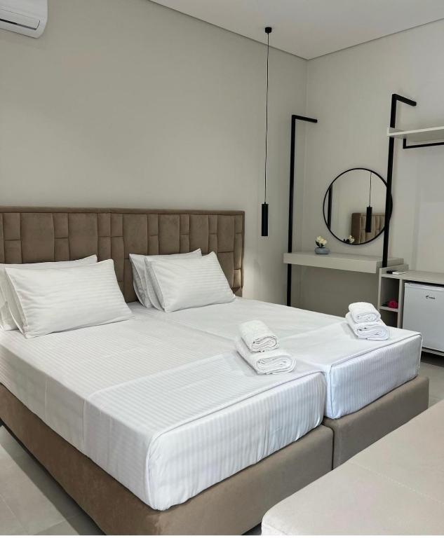Postel nebo postele na pokoji v ubytování Astoria Rooms