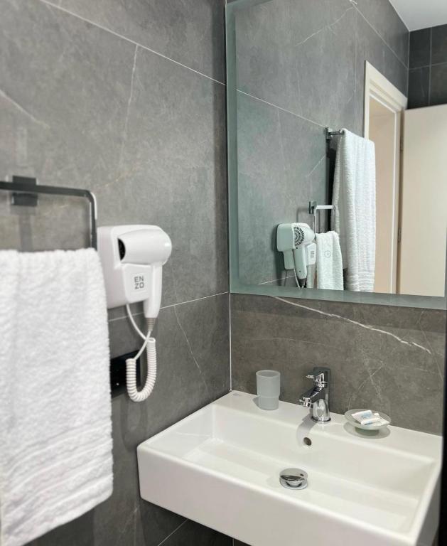 Koupelna v ubytování Astoria Rooms