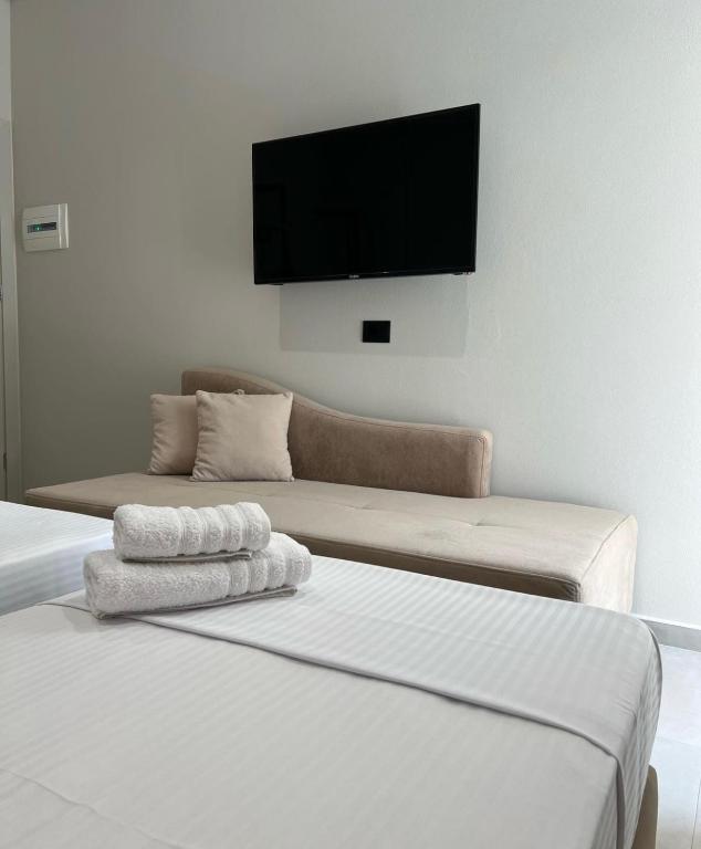 Postel nebo postele na pokoji v ubytování Astoria Rooms